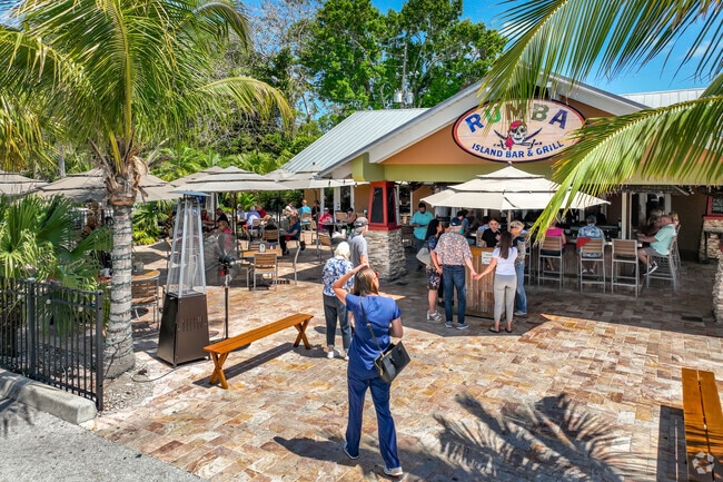 Rumba welcomes neighbors to enjoy island cusine nearby.