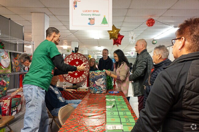 Locals press their luck on a spinning game at St Paul's Christmas Market in Norristown.
