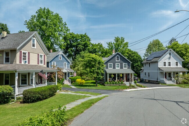 Craftsman and Colonial-style homes line quiet residential streets in Warwick, New York.