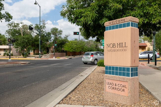 A tile monument welcomes visitors to the Lead & Coal Corridor in Nob Hill.