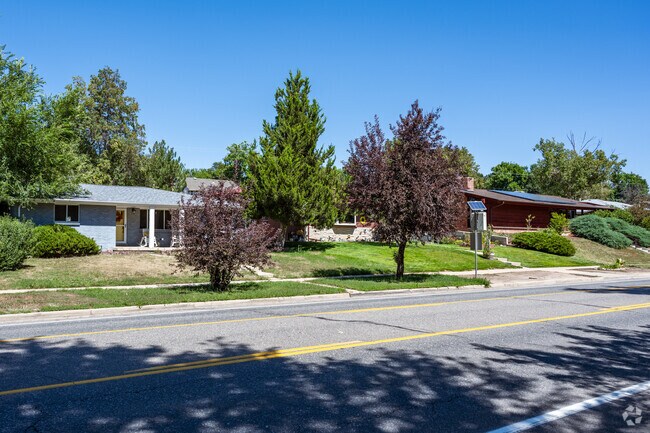 Traditional ranch homes along the roadway in Ridgeview Heights, Broomfield, Colorado.
