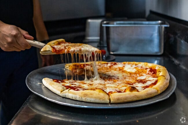 Get your cheese fix at J&P Pizza in South Spring Ridge.