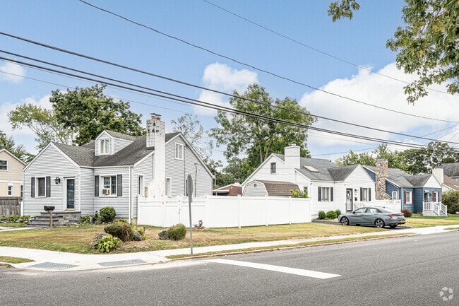 Capes with chimneys are common in Blue Point.