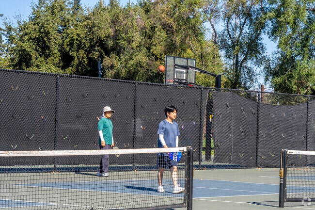 Challenge your friends in a pickleball match at John Mise Park where they have multiple courts.