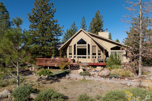 A Lake Shastina home features a spacious deck for enjoying Northern California views.
