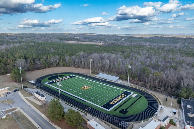 Cheer on the football team at Corner High School.