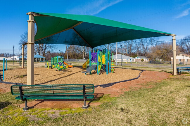 The Shed Road Community Playfield and Swan Lake Park are two popular parks in the vicinity.