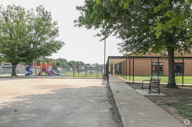 Verdigris Upper Elementary provides students covered walkways for shade and cover from the rain.