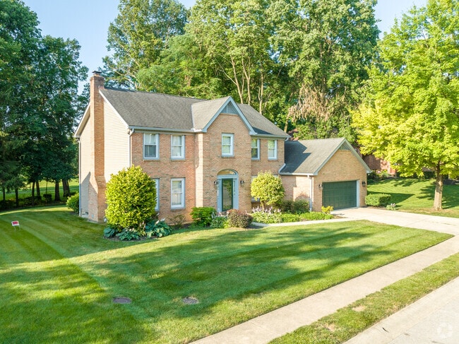 Homes in the Scioto Trace neighborhood have well-manicured front yards.