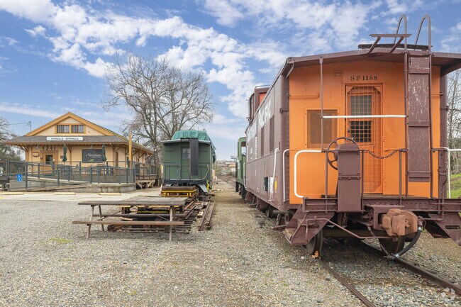 Order a pizza at R Newman's Eatery and checkout El Dorado Western Railroad trains.