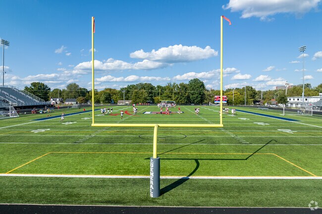 Cheer on the team on the football field at Lafayette High.