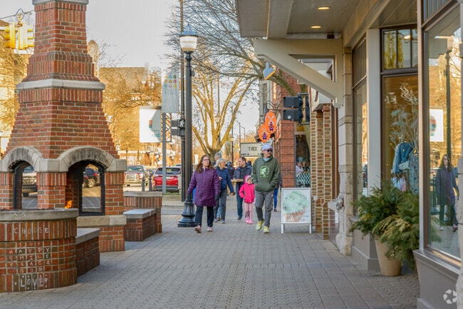 A family shops in Downtown Holland, located just a few minutes from Maplewood.