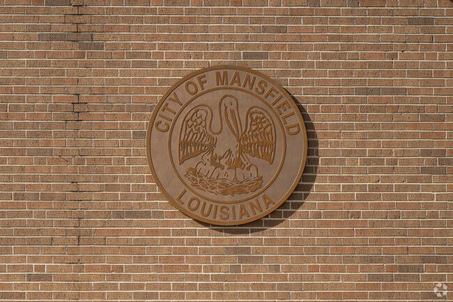A pelican feeding its young is symbolic for the way Mansfield Louisiana cares for its residents.