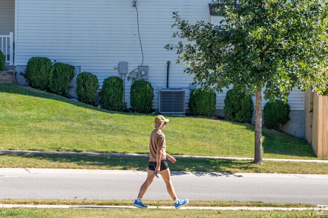 Paved paths connect homes to parks and playgrounds throughout the area.