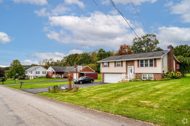 A split-level leads this row of homes in Big Beaver.
