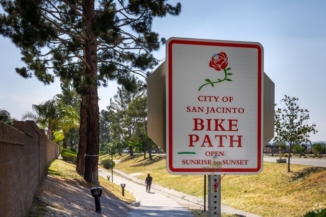 Resident takes a walk on a bike path located in San Jacinto City.