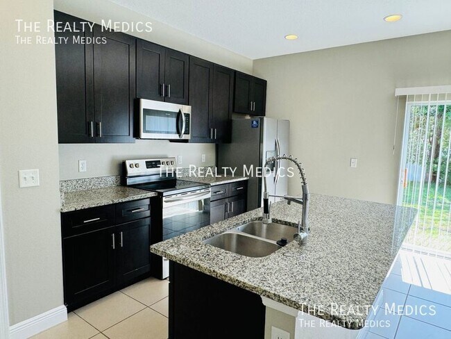 1417 Swan Ct, Kissimmee, FL 34759 - photo 6