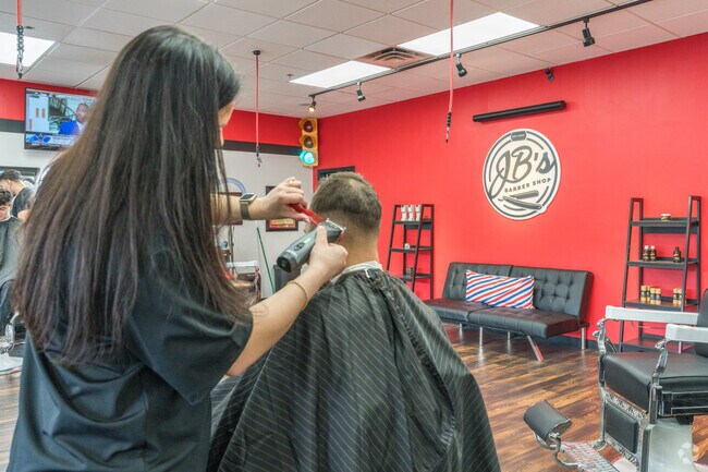 Residents stop in at JB's Barber Shop in Caln Village for a fresh haircut.