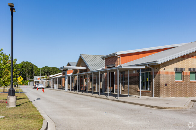 Philip Simmons Middle School in Charleston has a covered pick up and drop off area for students.