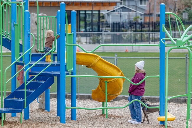 Mother and child enjoying the Fircrest Park playground.