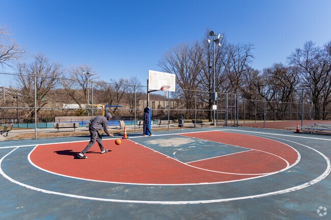 Yosemite Park, near Hartsdale, has active basketball courts.