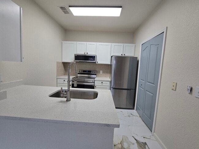 6137 Metrowest Blvd unit 6137 Metrowest Blvd., Orlando, FL 32835 - photo 4