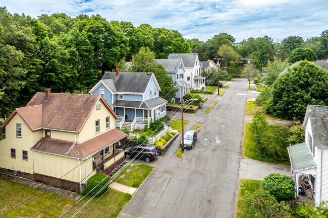 A row of classic New Englander style homes in the East Side neighborhood of Wakefield, MA.