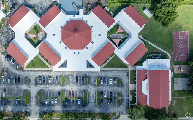 Ample parking is available on the south side of St. Thomas Aquinas Catholic School.