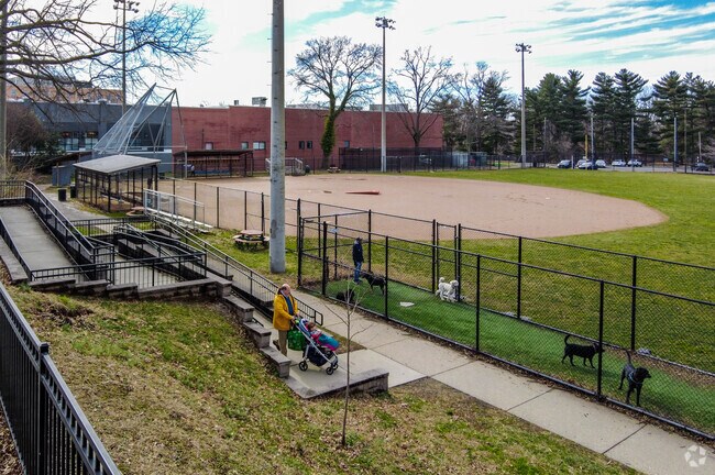 Guy Mason Recreation Center in Glover Park features a baseball field near trails and residential homes.