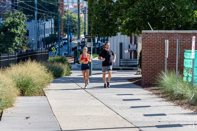 The Charlotte Rail Trail offers a vibrant pathway extending 3.5 miles.