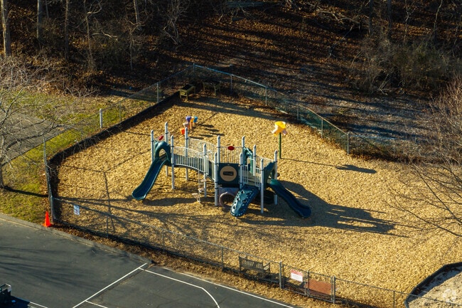 Hunt Ridge Montessori School has a play area for kids.