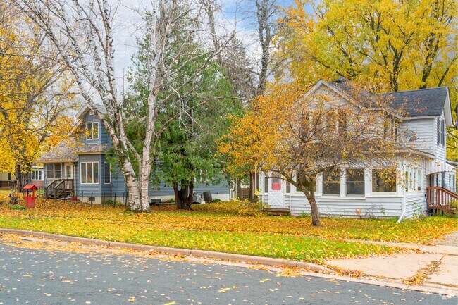 Quiet neighborhoods in Hammond feature common single-family home styles surrounded by mature trees.