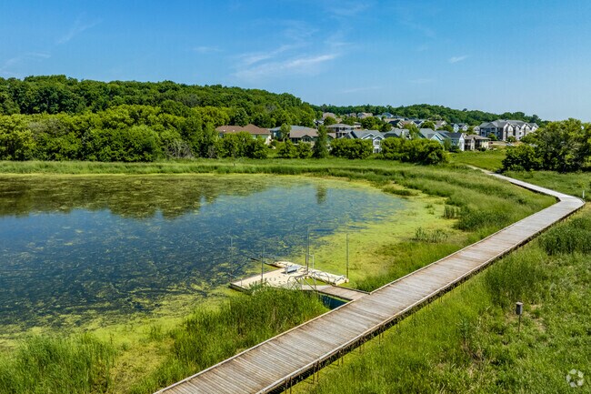 Take an afternoon stroll down Graber Pond's quiet boardwalk in Northside.