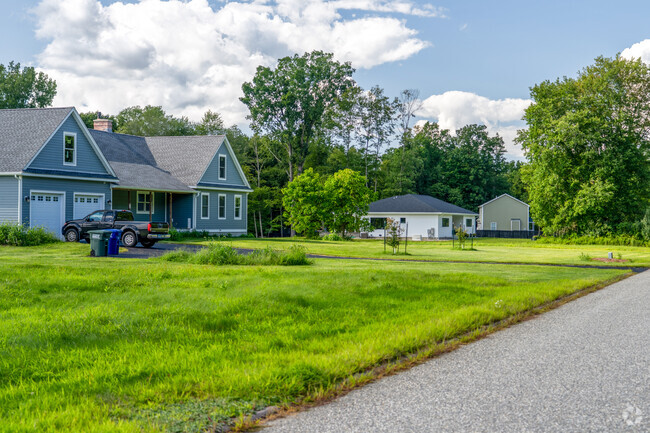 A row of homes in Franklin sit on large plots of land.