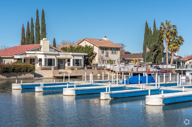 Explore the charming waterfront Spanish Revival homes nestled in Spring Valley Lake.