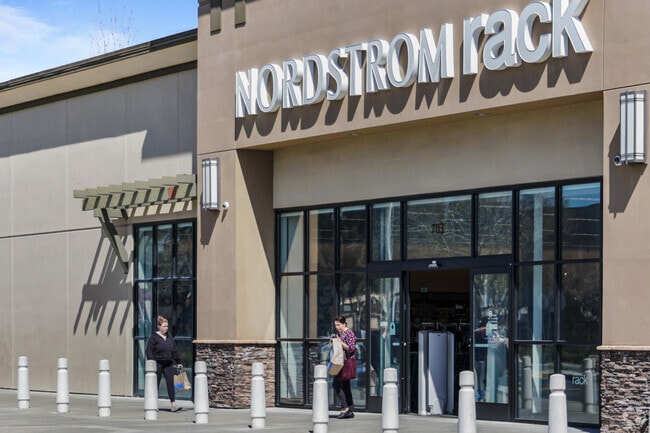 Bargain hunters explore the latest finds at Nordstrom Rack in Sun Terrace.