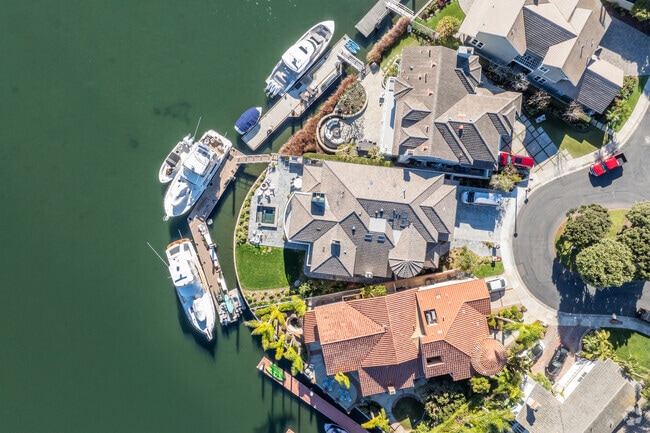 Huntington Beach Harbor is home to large homes with private docks and boats.