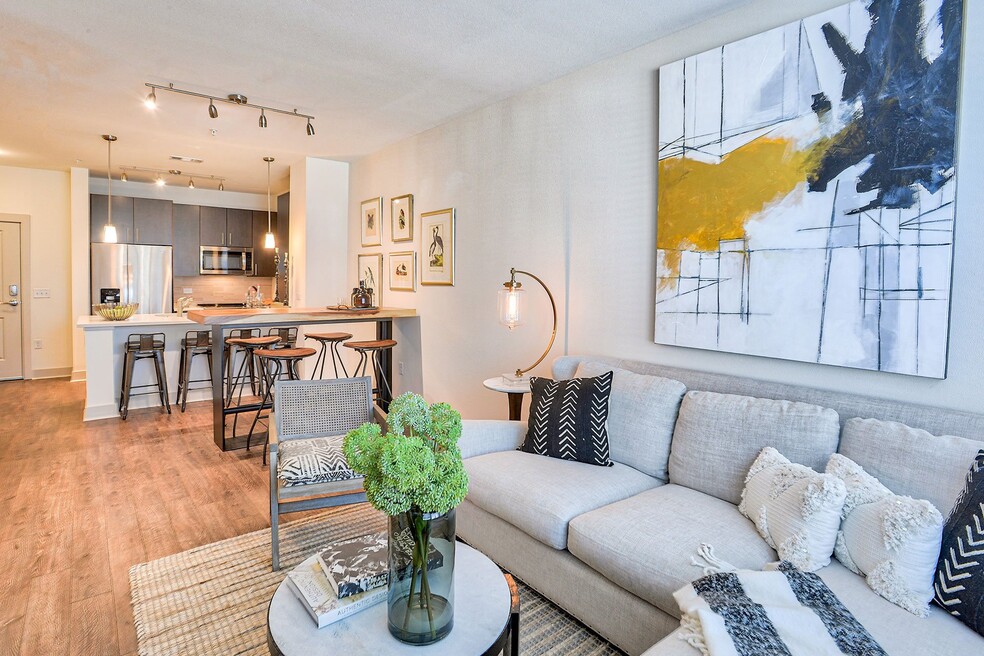 Continuous wood-style flooring throughout the living areas