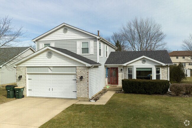 Homes in Twin Lakes sit on well-maintained lawns.