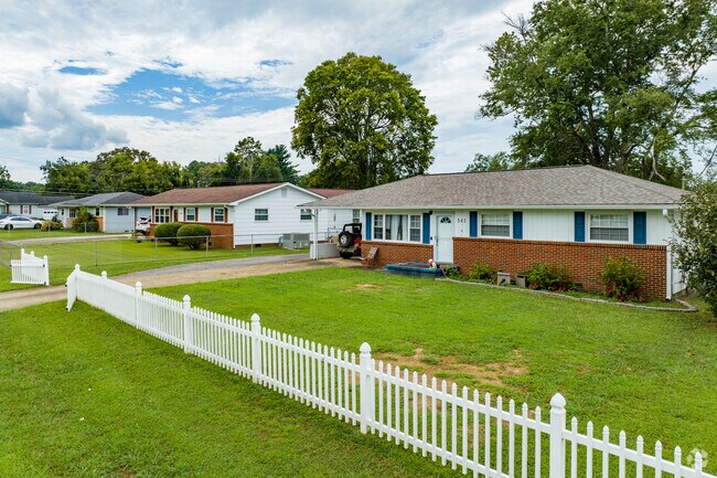 Homes in Dallondale sit back on wooded lots with mature trees.