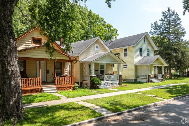 Bungalow homes shaded by large mature oaks line the streets of Central Park.