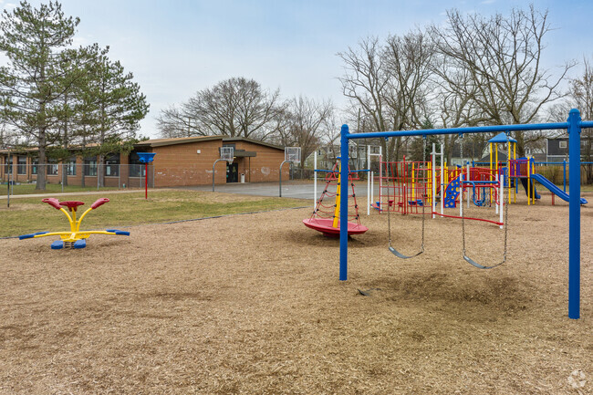 Kids love the playground equipment at Rogers Elementary School in Berkley.