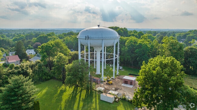 The Reisterstown water tower stands tall among the residential houses surrounding it.