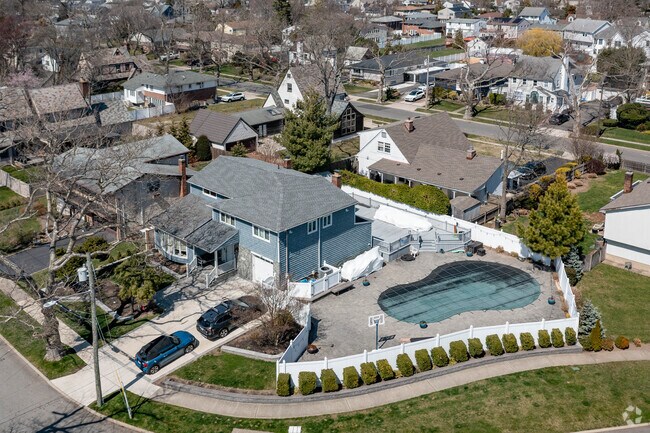 Large colonial homes, many with built in swimming pools can be found in Oceanside.