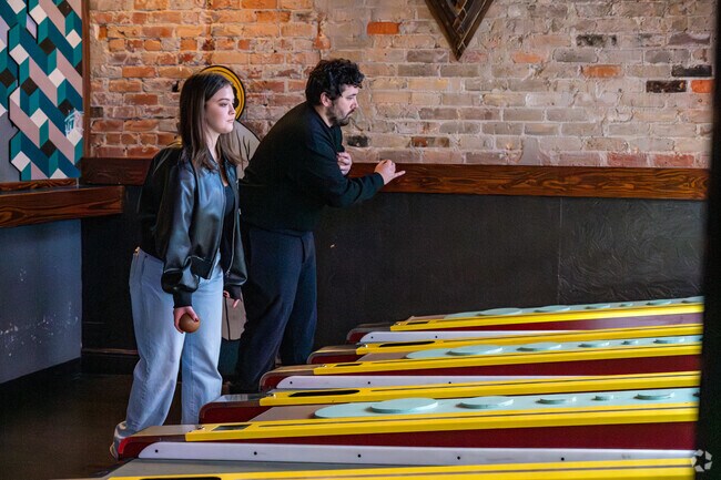 Mill Pond residents can enjoy a night at the Arcade Bar in downtown Gainesville.