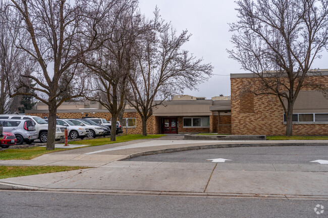 Orchard Center Elementary features a dedicated staff parking lot.