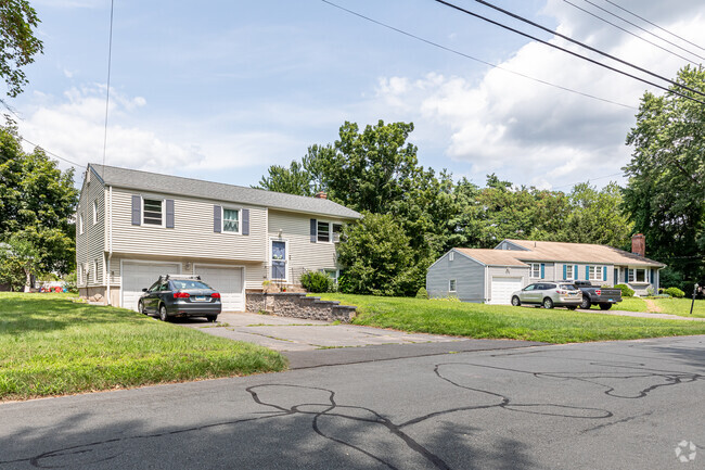You will find a mix of ranches and splits on the side streets of Weatogue.