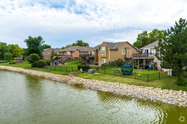 Several homes in Tyler's Landing back up to a small lake.
