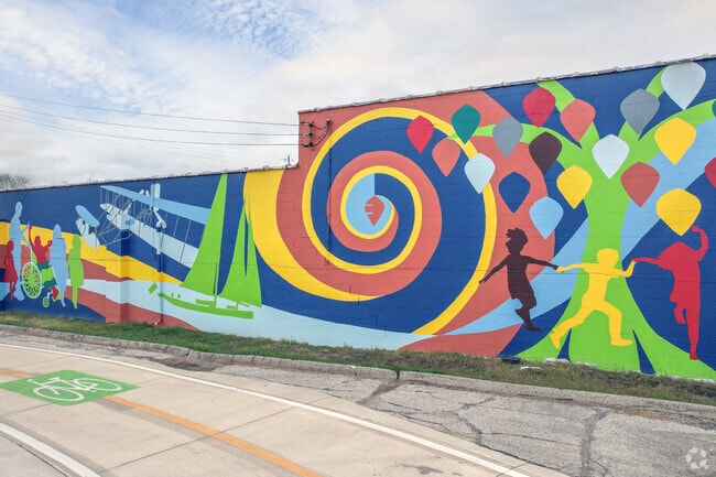 While riding your bike along the bike trail, you can find beautiful murals in Old North Dayton.