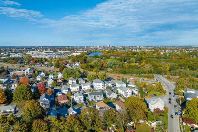 Spectacle sits quietly five miles west of downtown Providence, framed by autumn foliage.
